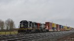 Death Star IC 1011 lead of a CN unit stack train, waiting for crew in Fisher Siding, to head E/B.